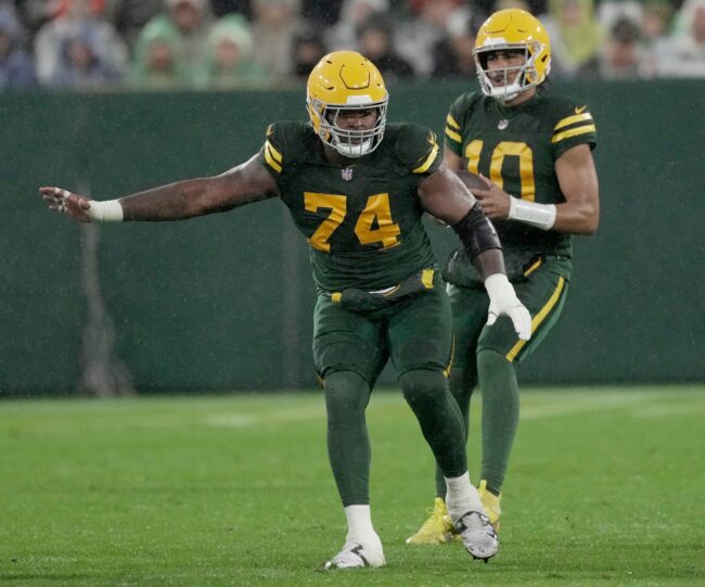 Filling in for injured center Josh Myers, Green Bay Packers guard Elgton Jenkins (74) provides pass protection during the second quarter of their game against Detroit Lions Sunday, November 3, 2024 at Lambeau Field in Green Bay, Wisconsin. © Mark Hoffman/Milwaukee Journal Sentinel / USA TODAY NETWORK via Imagn Images